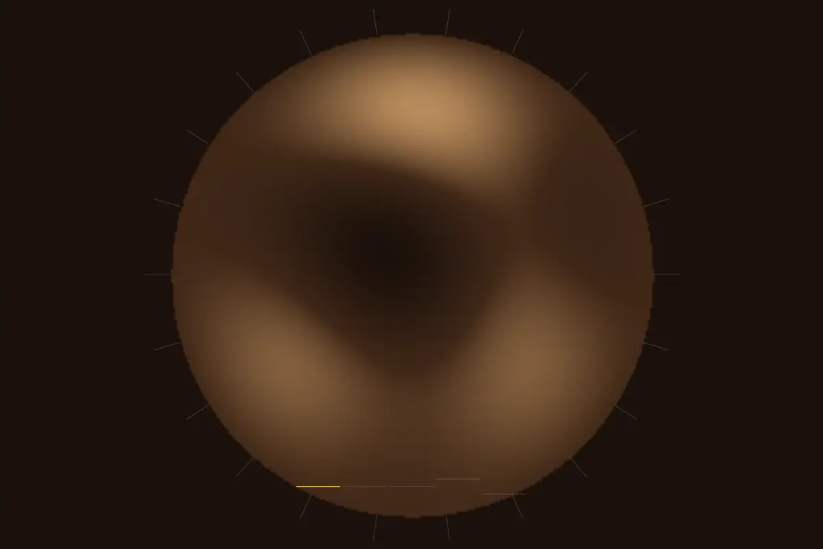 A dundun drum head lit from above, its tension cords running down
                  the shell.